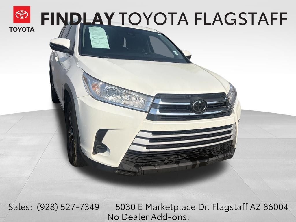 2017 Toyota Highlander LE in Blizzard Pearl — front three-quarter view